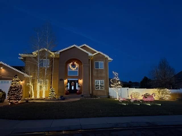 Stucco Home — Holiday Lighting — Chess Remodels project