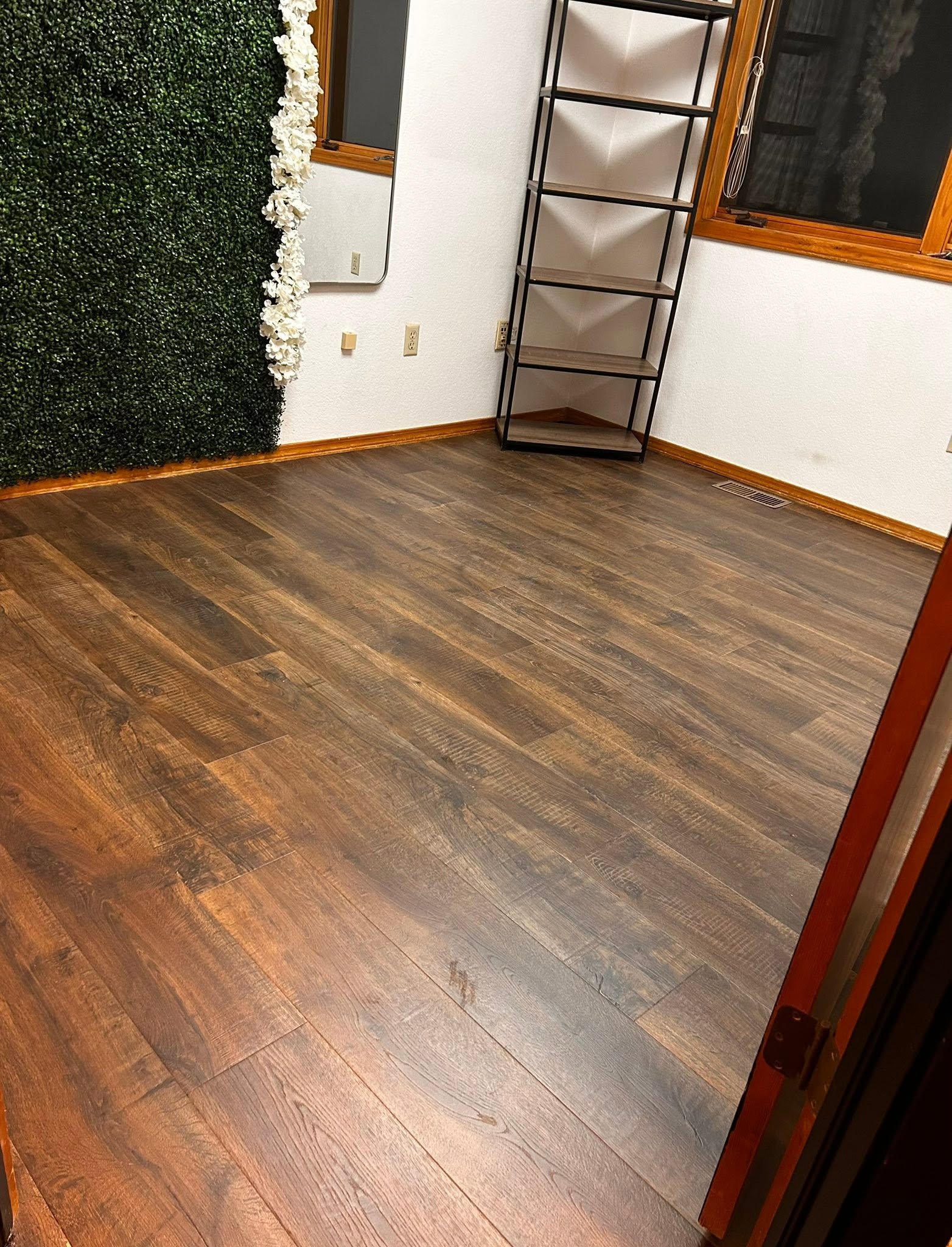 Dark LVP & Boxwood Wall — Chess Remodels project