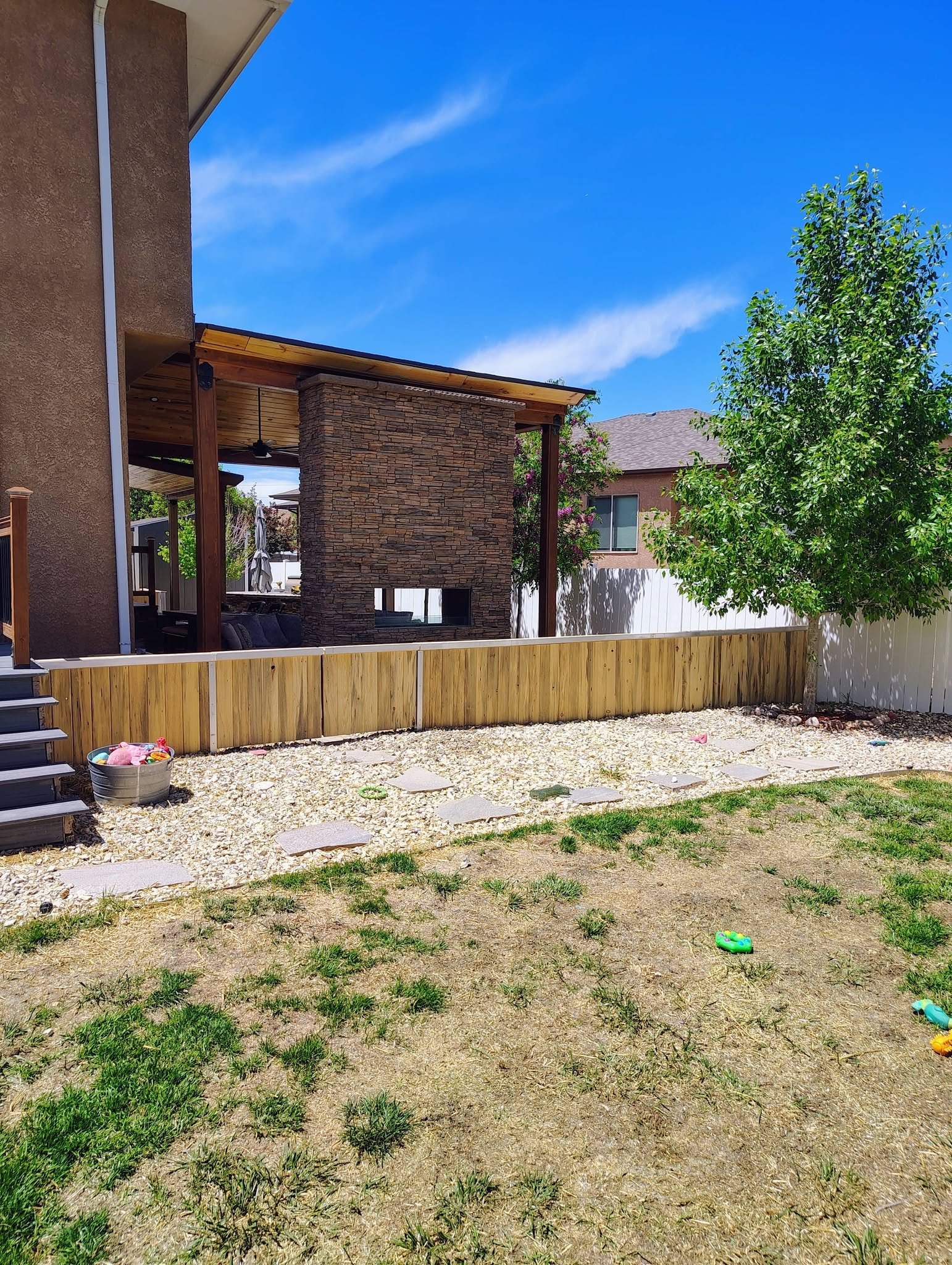 Stone Fireplace & Pergola — Chess Remodels project